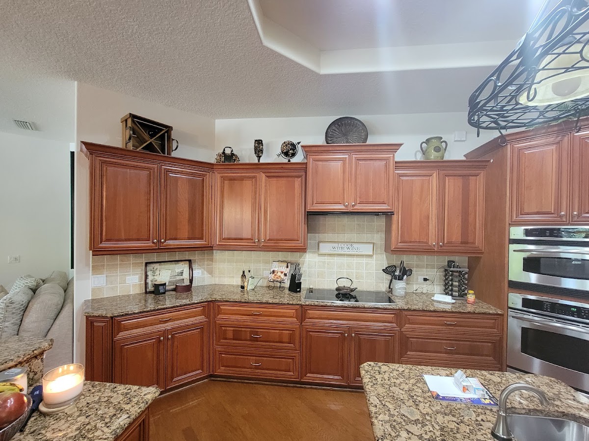 Traditional raised-panel wood kitchen cabinetry